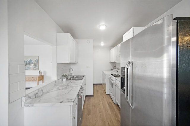 7927 164th Pl Unit 236, Tinley Park, IL 60477 - kitchen with stainless steel refrigerator with ice dispenser, gas range gas stove, light wood-type flooring, white cabinets, and decorative backsplash
