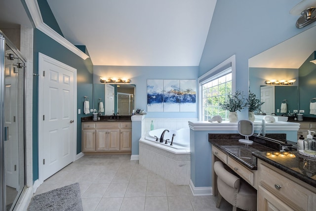 624 Pottawatomie Trl, Batavia, IL 60510 - bathroom featuring lofted ceiling, a shower stall, a bath, tile patterned flooring, and vanity