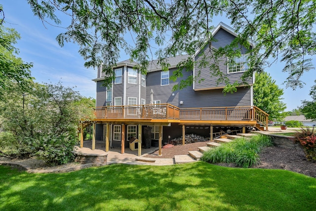 624 Pottawatomie Trl, Batavia, IL 60510 - back of property with a wooden deck, a lawn, a patio area, and stairway
