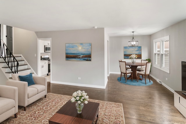326 W Hawthorne Blvd, Mundelein, IL 60060 - living area featuring dark wood finished floors, stairway, and a chandelier