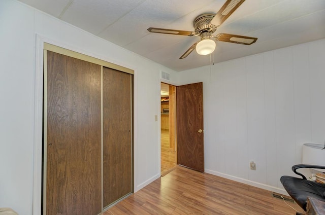 449 W 6th St, Braidwood, IL 60408 - unfurnished room with wood finished floors and a ceiling fan