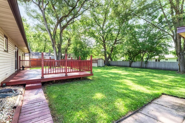 449 W 6th St, Braidwood, IL 60408 - fenced backyard featuring a storage unit and a deck