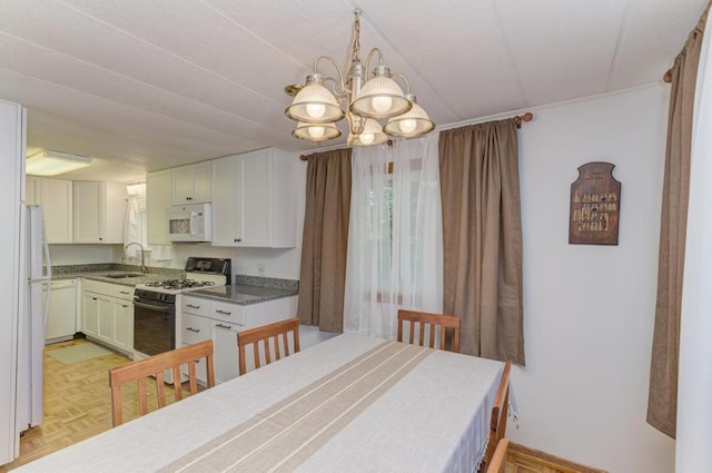 449 W 6th St, Braidwood, IL 60408 - dining room with a chandelier