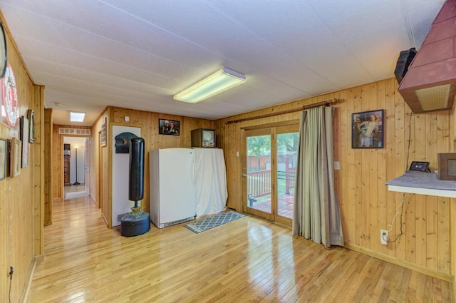 449 W 6th St, Braidwood, IL 60408 - spare room with wood walls and light wood-type flooring