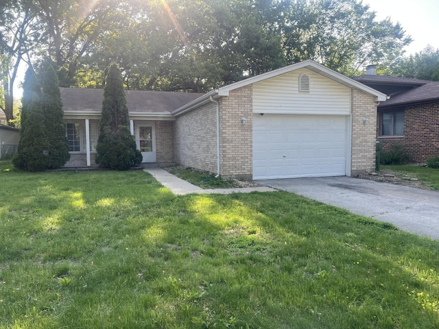 14644 Ellis Ave, Dolton, IL 60419 - ranch-style home with brick siding, driveway, a front yard, and a garage