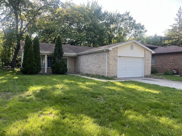 14644 Ellis Ave, Dolton, IL 60419 - ranch-style house featuring an attached garage, brick siding, a front yard, and driveway