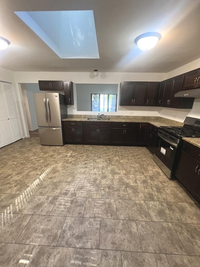 14644 Ellis Ave, Dolton, IL 60419 - kitchen with stainless steel appliances, light stone countertops, and under cabinet range hood
