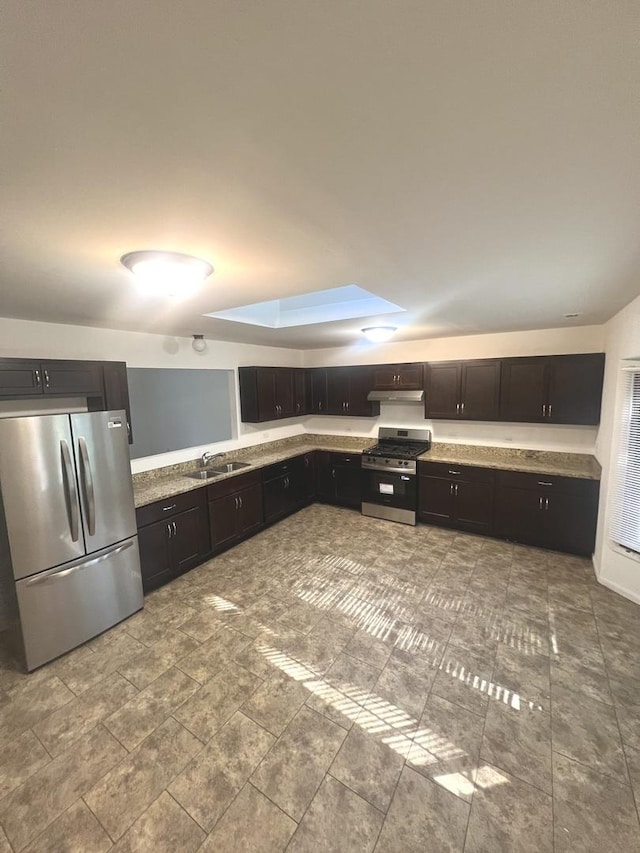 14644 Ellis Ave, Dolton, IL 60419 - kitchen with stainless steel appliances, under cabinet range hood, and light countertops