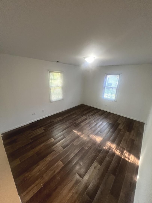 14644 Ellis Ave, Dolton, IL 60419 - spare room with dark wood-style floors