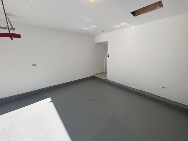 14644 Ellis Ave, Dolton, IL 60419 - spare room featuring finished concrete floors
