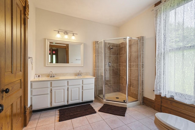 466 Quail Trap Rd, Caledonia, IL 61011 - full bathroom with a shower stall, double vanity, and tile patterned floors