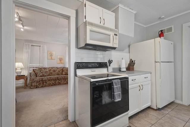 466 Quail Trap Rd, Caledonia, IL 61011 - kitchen with white appliances, white cabinetry, light countertops, decorative backsplash, and ornamental molding