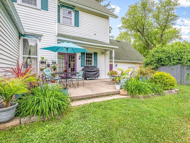 466 Quail Trap Rd, Caledonia, IL 61011 - back of house with a patio and a shingled roof