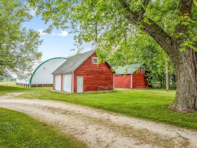 466 Quail Trap Rd, Caledonia, IL 61011 - view of barn with a lawn and dirt driveway