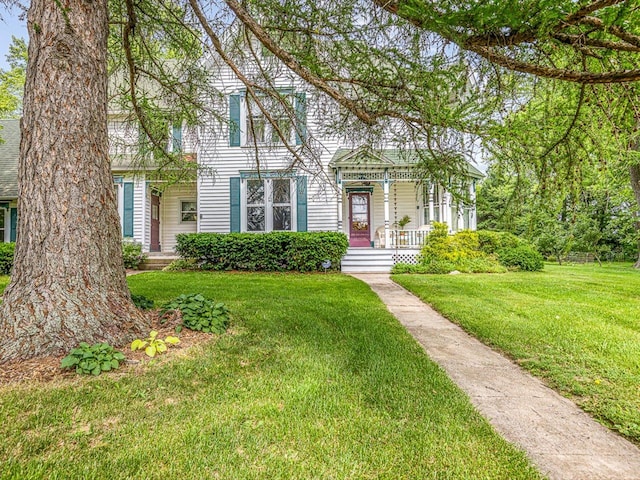 466 Quail Trap Rd, Caledonia, IL 61011 - view of front of property featuring a front lawn and a porch