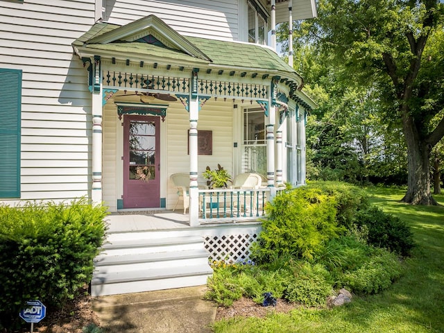 466 Quail Trap Rd, Caledonia, IL 61011 - doorway to property featuring covered porch