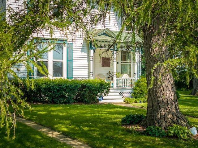 466 Quail Trap Rd, Caledonia, IL 61011 - doorway to property with a lawn
