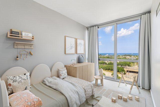 1841 S Calumet Ave Unit 1302, Chicago, IL 60616 - bedroom featuring floor to ceiling windows and carpet flooring
