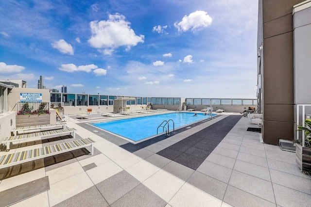 1841 S Calumet Ave Unit 1302, Chicago, IL 60616 - community pool featuring a patio area