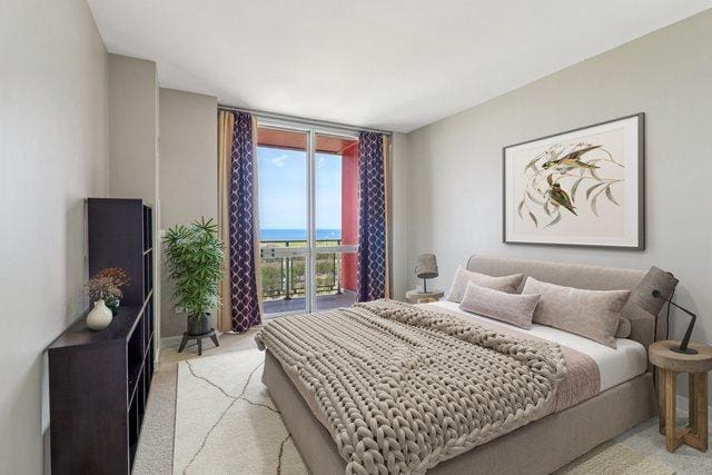 1841 S Calumet Ave Unit 1302, Chicago, IL 60616 - bedroom featuring access to exterior, a wall of windows, and light colored carpet