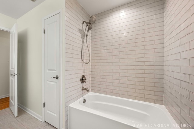 140 W Adams St, Villa Park, IL 60181 - bathroom with shower / washtub combination and tile patterned flooring