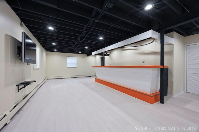 140 W Adams St, Villa Park, IL 60181 - below grade area featuring wood finished floors, a baseboard heating unit, and recessed lighting