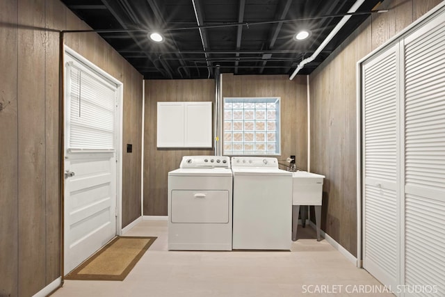 140 W Adams St, Villa Park, IL 60181 - laundry room featuring wooden walls, washer and clothes dryer, and cabinet space