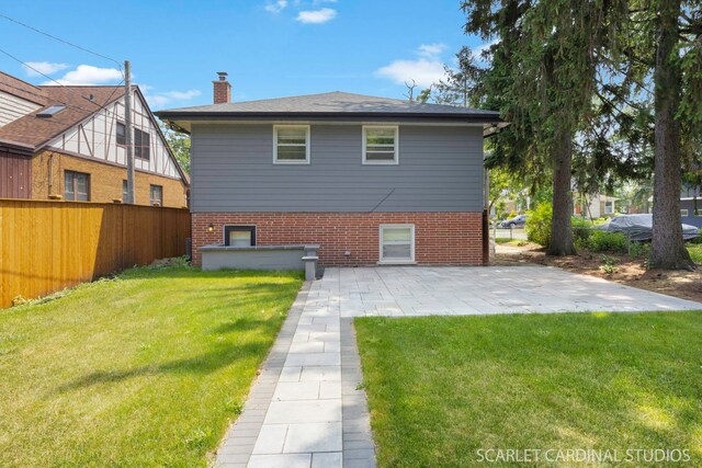 140 W Adams St, Villa Park, IL 60181 - back of house featuring a patio area, a chimney, and brick siding