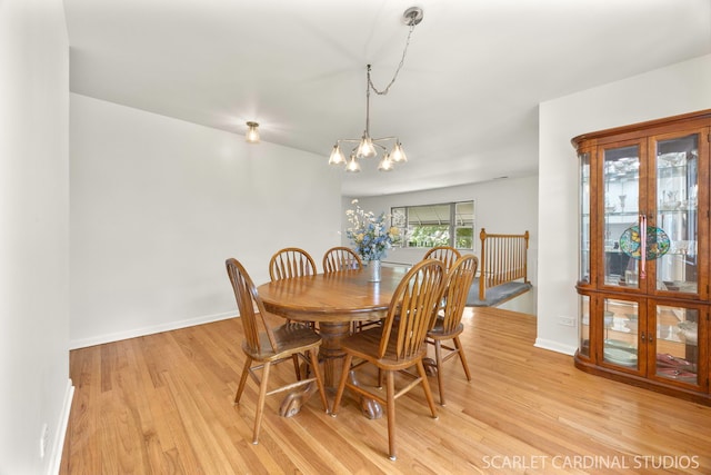140 W Adams St, Villa Park, IL 60181 - dining space with a chandelier and light wood-style floors