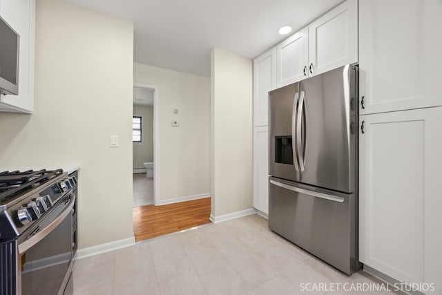140 W Adams St, Villa Park, IL 60181 - kitchen with appliances with stainless steel finishes, white cabinetry, recessed lighting, and light tile patterned flooring