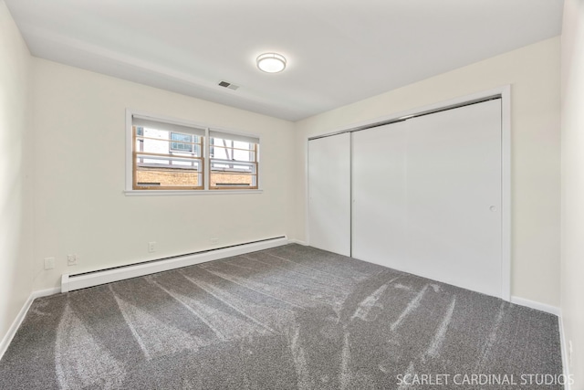 140 W Adams St, Villa Park, IL 60181 - unfurnished bedroom with baseboard heating, carpet, and a closet