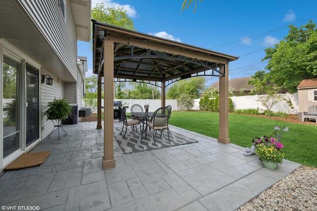 1407 N Dunton Ave, Arlington Heights, IL 60004 - fenced backyard with a gazebo, outdoor dining space, and a patio area