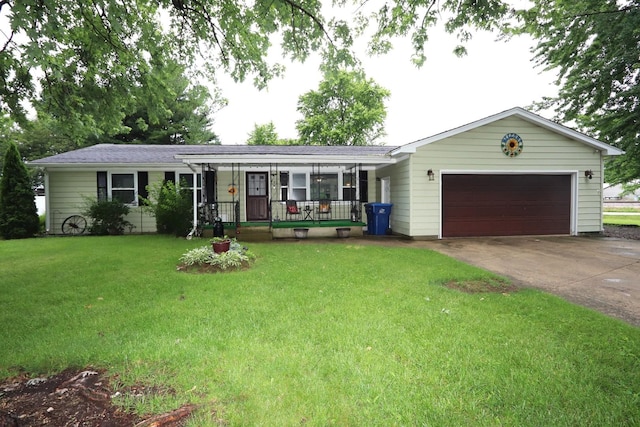 403 10th St, Mazon, IL 60444 - ranch-style home with covered porch, a front yard, concrete driveway, and an attached garage