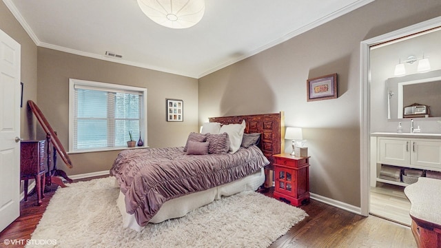 4550 N Malden St Unit 1W, Chicago, IL 60640 - bedroom with crown molding, wood finished floors, and ensuite bath
