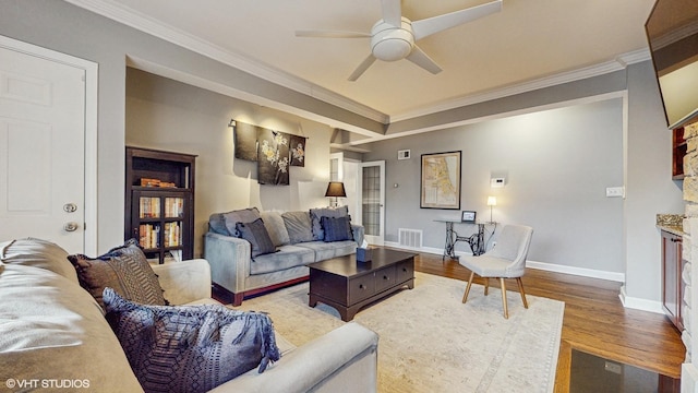 4550 N Malden St Unit 1W, Chicago, IL 60640 - living room featuring a ceiling fan, crown molding, wood finished floors, and a fireplace