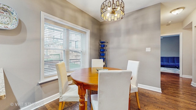 4550 N Malden St Unit 1W, Chicago, IL 60640 - dining room with wood finished floors and a chandelier