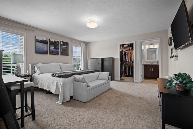 2321 Corrigan Way, Normal, IL 61761 - bedroom featuring light colored carpet, a closet, ensuite bathroom, and a spacious closet