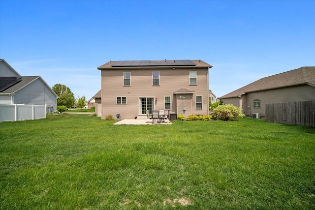 2321 Corrigan Way, Normal, IL 61761 - rear view of house with a patio area and roof mounted solar panels