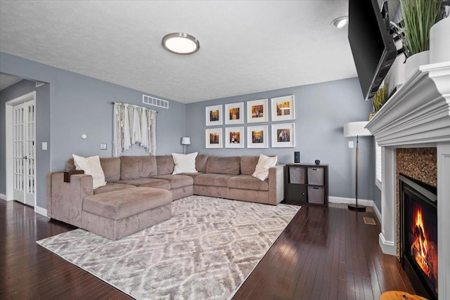 2321 Corrigan Way, Normal, IL 61761 - living area featuring a fireplace and dark wood-type flooring