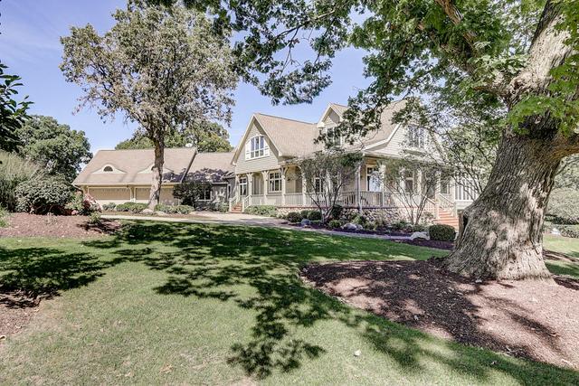 42720 N Converse Rd, Antioch, IL 60002 - view of front of house with a front lawn and a porch