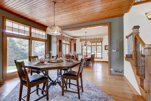 42720 N Converse Rd, Antioch, IL 60002 - dining space with a chandelier, wooden ceiling, stairway, and light wood-style floors