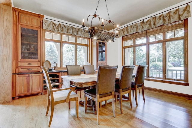 42720 N Converse Rd, Antioch, IL 60002 - dining space featuring a chandelier and light wood-style flooring