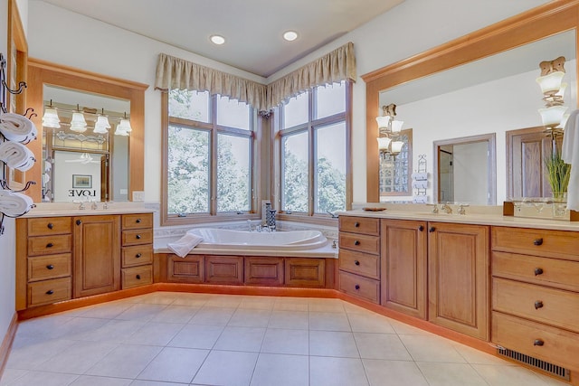 42720 N Converse Rd, Antioch, IL 60002 - bathroom with a garden tub, two vanities, tile patterned floors, and recessed lighting