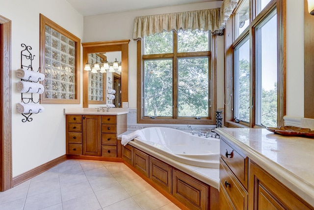 42720 N Converse Rd, Antioch, IL 60002 - full bath featuring healthy amount of natural light, vanity, a whirlpool tub, and tile patterned flooring