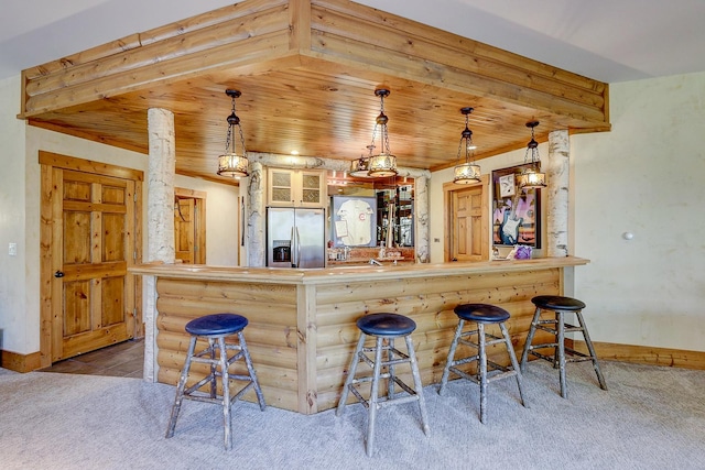 42720 N Converse Rd, Antioch, IL 60002 - kitchen with stainless steel fridge with ice dispenser, carpet, glass insert cabinets, a breakfast bar area, and a peninsula