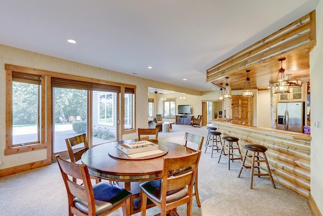 42720 N Converse Rd, Antioch, IL 60002 - dining space with light colored carpet, recessed lighting, and rustic walls