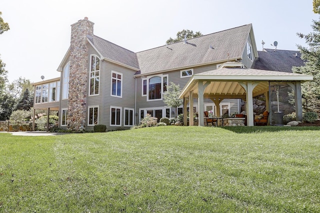 42720 N Converse Rd, Antioch, IL 60002 - rear view of property featuring a gazebo, a chimney, a yard, and stone siding
