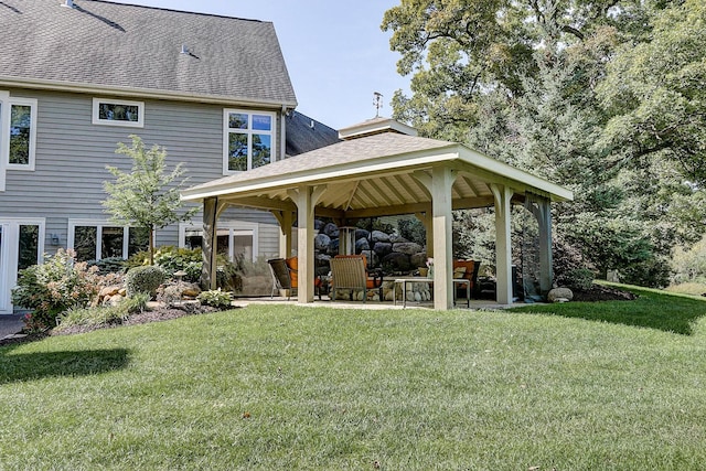 42720 N Converse Rd, Antioch, IL 60002 - rear view of property with a gazebo, roof with shingles, a yard, and a patio area