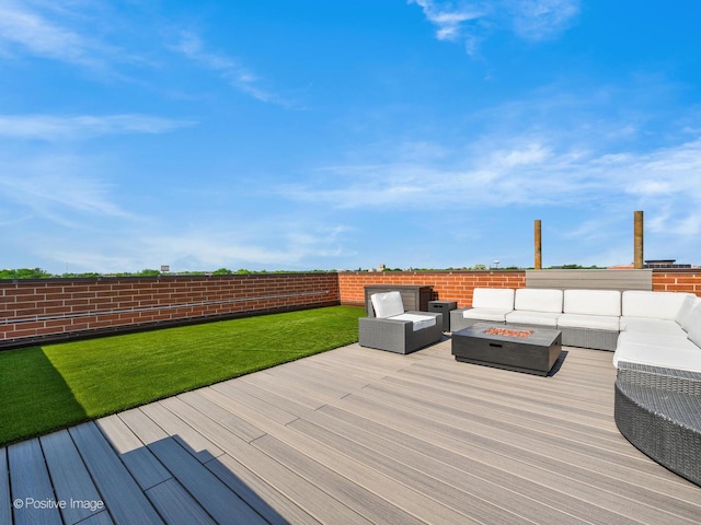 2707 W Belmont Ave Unit 4W, Chicago, IL 60618 - wooden deck featuring an outdoor living space with a fire pit and a yard