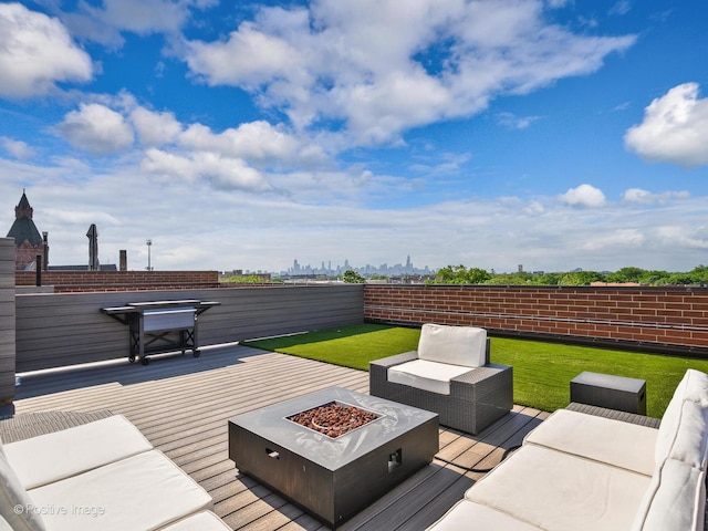 2707 W Belmont Ave Unit 4W, Chicago, IL 60618 - wooden deck with an outdoor living space with a fire pit and a yard